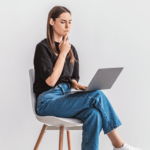 woman looking at her computer