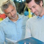 managers looking over paperwork at facility