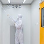 healthcare worker cleaning critical environment