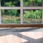 return grille next to window