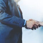 business leaders shaking hands