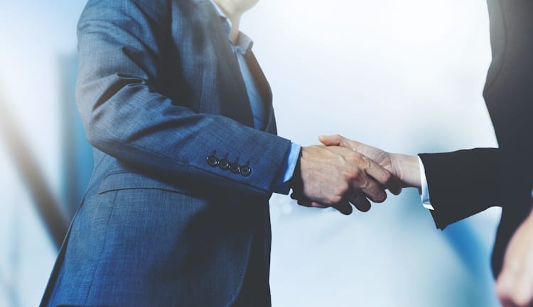 business leaders shaking hands