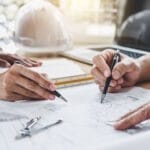 architect team reviewing plans