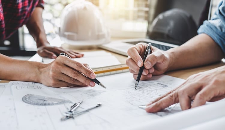 architect team reviewing plans